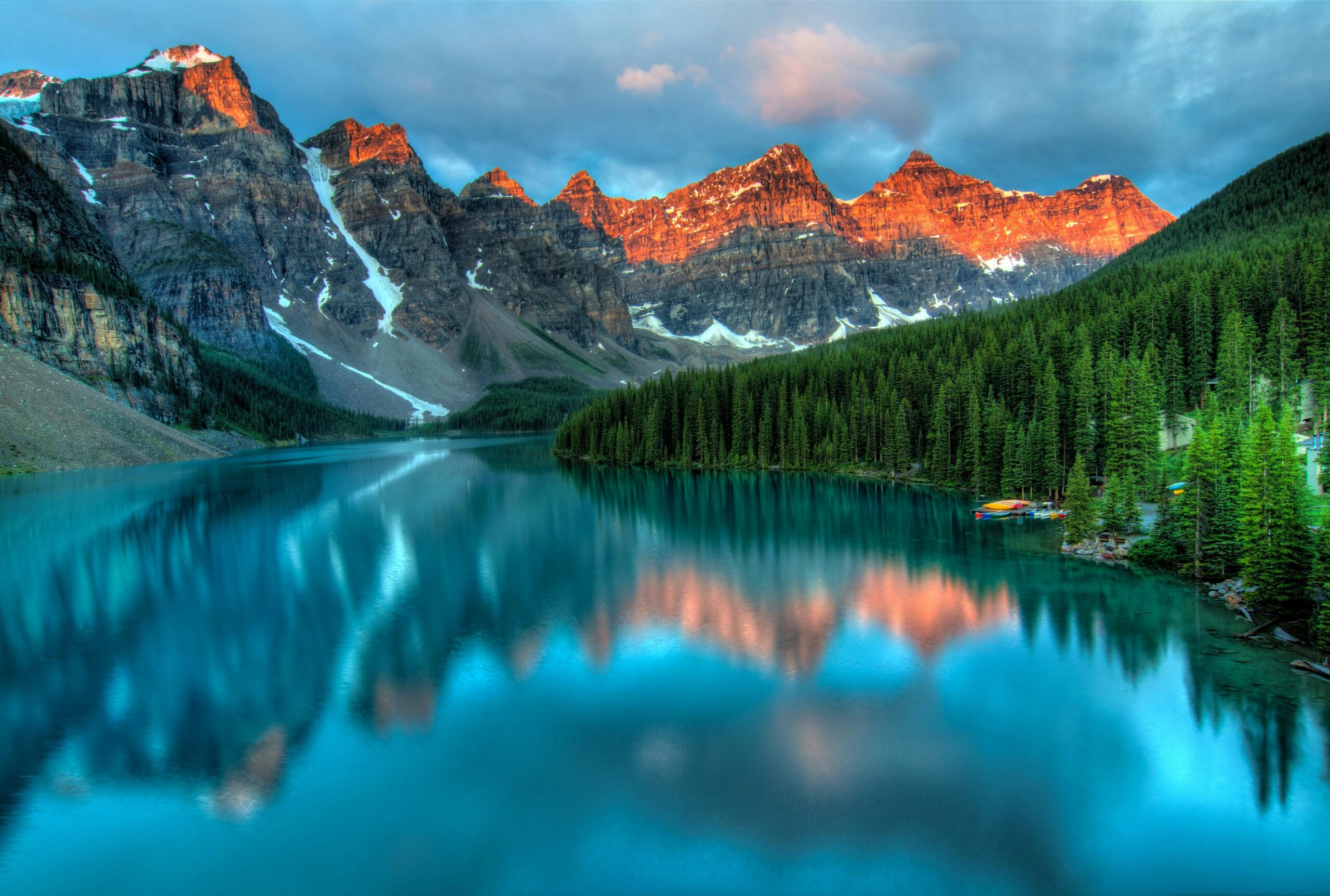 Canadian mountains on a beautiful, glacier fed lake at dawn.